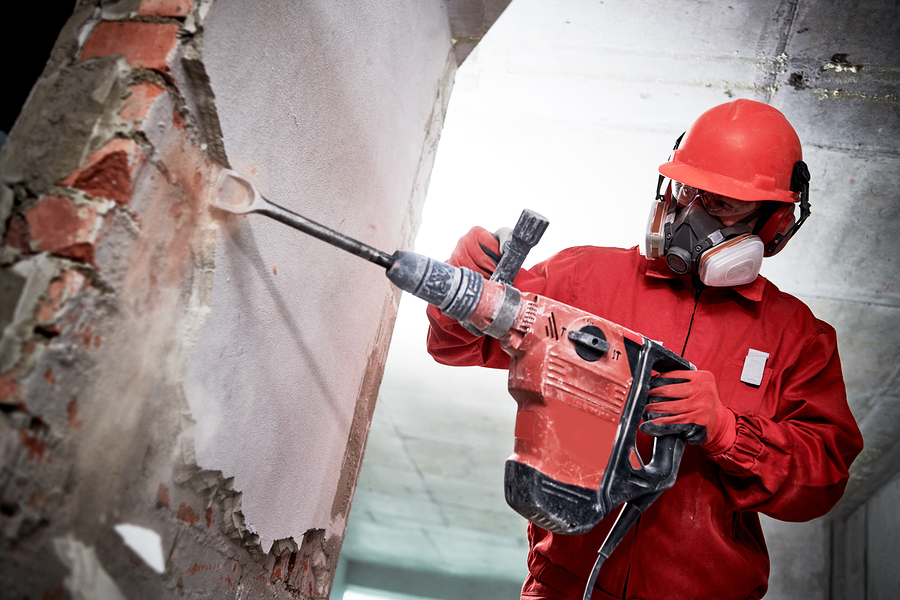 man holding a tool