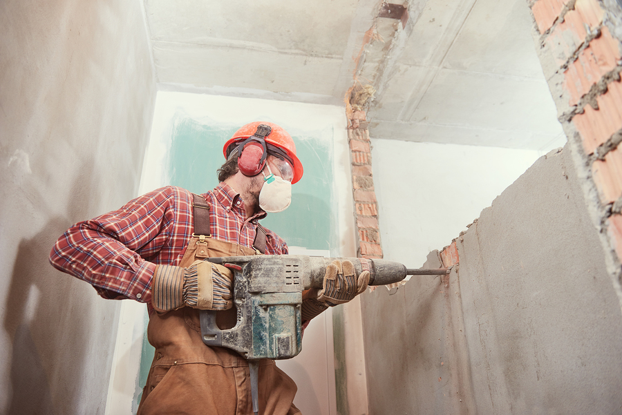 man demolish the house